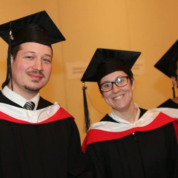 A trio of graduting students - Jaden, Chloe, and Samuel