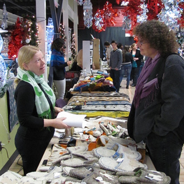  Fair trade sale (2) Lana encouraging the sale of items to Rachel during the fair trade fair.