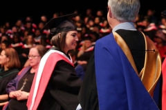 Sharae receiving degree from John Black, Dean of Social Sciences