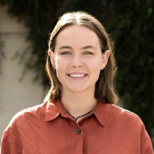 Hannah Groot smiling outdoors.