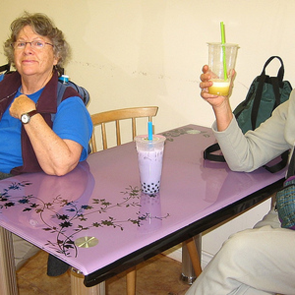 Cheers to bubble tea! Here are two of the Chinatown Walking Tour participants indulging in bubble tea; it's their first time; May 20, 2009.