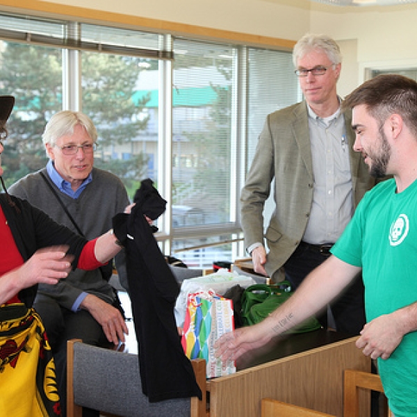 ASC t-shirt presented to Gay Brent, ASC chair, does the honour. Photo courtesy of JA. 